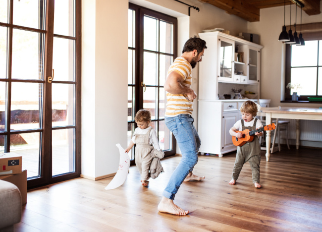 children-and-father-playing-music-at-home - The Educators' Spin On It Children and father playing music at home