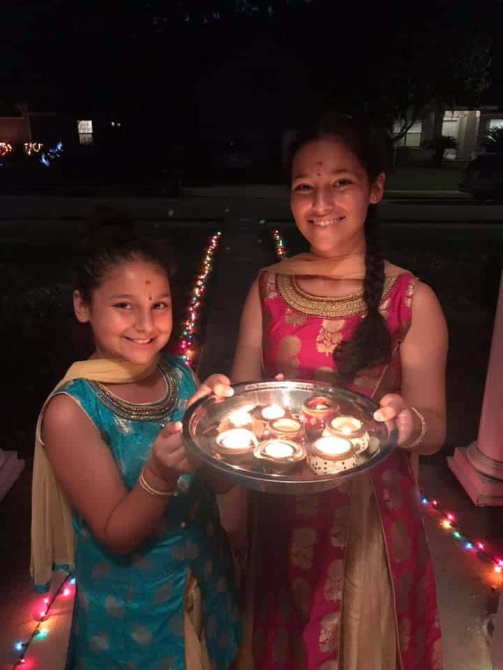 diwali-2019-kids- - The Educators' Spin On It kids-celebrating-diwali-holding-diyas