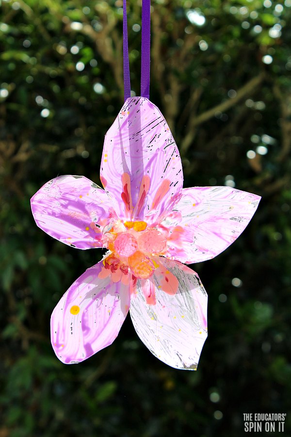 DIY Painted Flower Craft for Kids Using Recycled Plastic - The Educators' Spin On It DIY Painted Flower Craft for Kids Using Recycled Plastic
