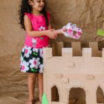 Egg Carton Dragon over Cardboard Castle with Preschooler