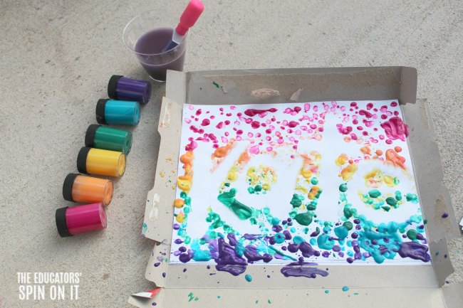 Drip-Painting-Rainbow-Name-Activity-for-Preschoolers - The Educators' Spin On It Outline of name from dripped paint in rainbow colors