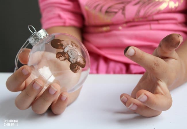 Fingerprint Gingerbread Man Ornament for your Christmas Tree Keepsakes - The Educators' Spin On It Fingerprint Gingerbread Man Ornament for your Christmas Tree Keepsakes