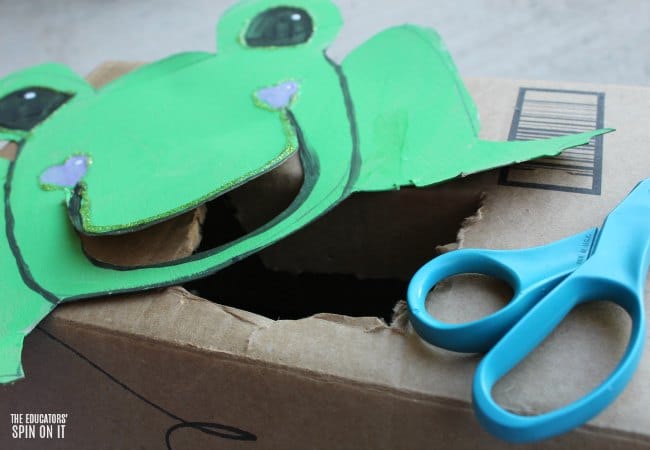 Frog Themed Toss Game for Preschoolers with Recycled Box - The Educators' Spin On It Frog Themed Toss Game for Preschoolers with Recycled Box
