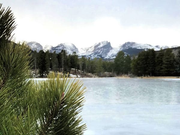 frozen-lake-rocky-mountins-virtual-field-trip - The Educators' Spin On It Frozen lake in Rocky mountains with mountains in backgroun