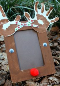 Reindeer handprint photo frame for a Handmade Gift Idea - The Educators' Spin On It Reindeer handprint photo frame for a Handmade Gift Idea