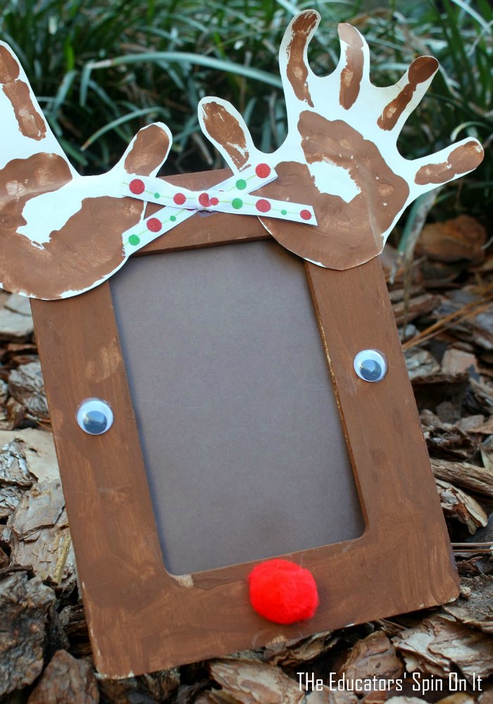 Reindeer handprint photo frame for a Handmade Gift Idea - The Educators' Spin On It Reindeer handprint photo frame for a Handmade Gift Idea