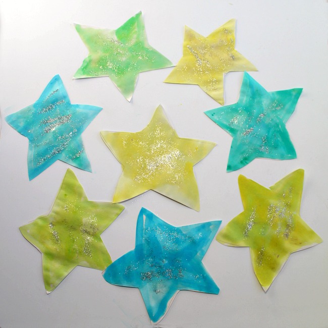 star-garland-craft-project-for-kids - The Educators' Spin On It Star Galrand craft Project with glitter