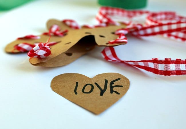 stuffing-hand-sewn-gingerbread-ornament-with-kids - The Educators' Spin On It Stuffing Hand Sewn Gingerbread Ornament with Kids