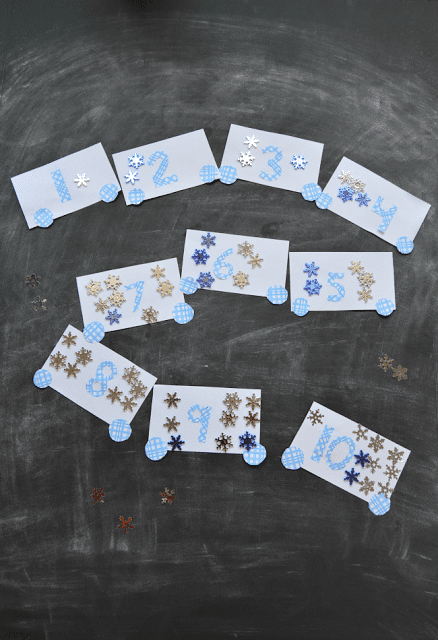 Snowflake Number Train Game for Kids to help word on number recognition and one to one correspondence with your preschooler.